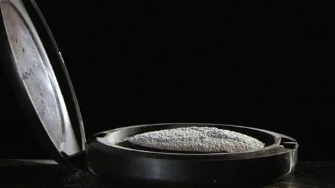 Close up of Powder brush on a black background. Macro shooting in studio Stock Footage 125321612