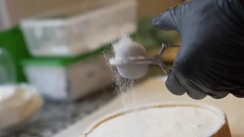 Close Up powder sugar coating Stock Footage 238503136