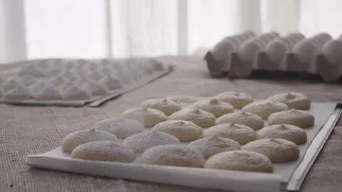 Close up of powdered sugar falling on powdered sweets, characteristic Chilean Video stock 240578783