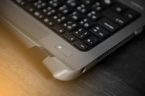 Close up to power button on laptop Stock Photos