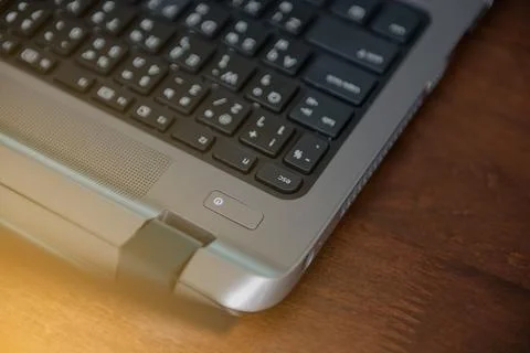 Close up to power button on laptop Stock Photos