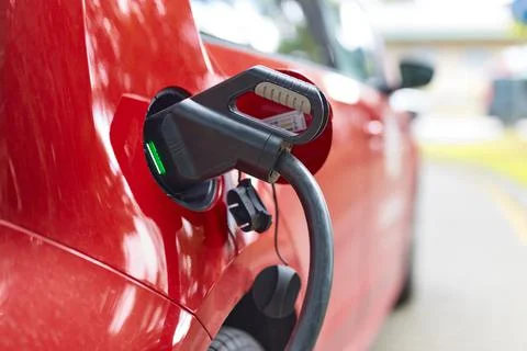 Close up power plug of EV Car or Electric car connect for charging station to Stock Photos