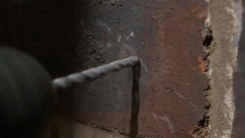 Close up of power tool drilling hole in engineering brick May 2017 England Stock Footage 82007646