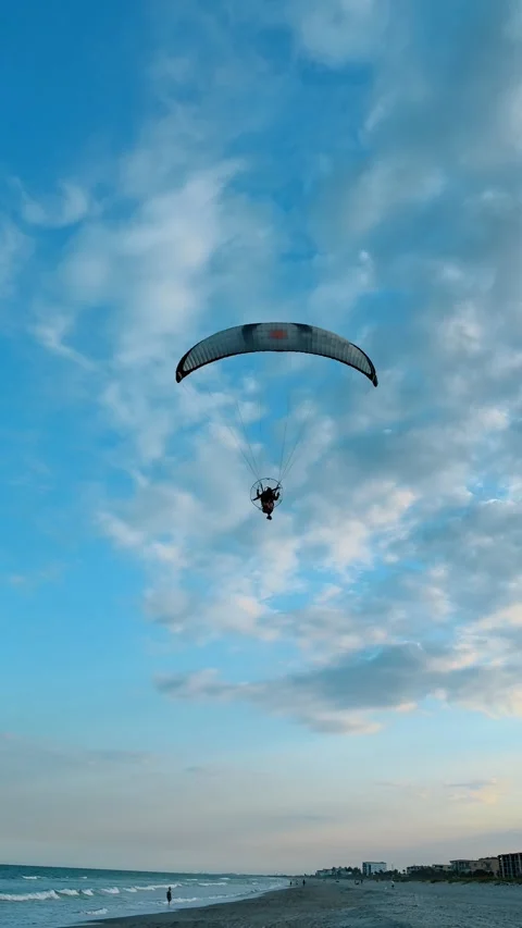 Close up of powered paraglider against blue sky background Stock Footage 332167271