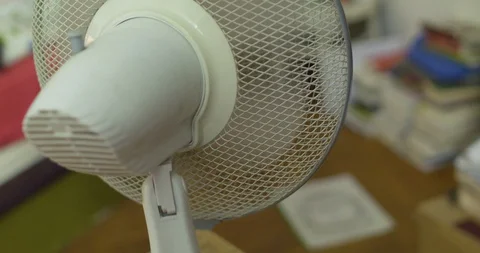 Close Up of Powered Ventilator in an Apartment / Focus Moves from Ventilator to Vidéo 129331879