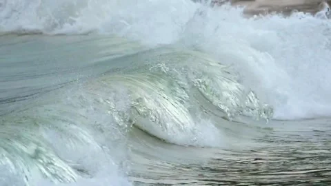 Close Up of Powerful Ocean Wave Curling and Breaking with Sea Foam Stock Footage 319804737