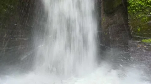 Close-up of powerful raging Sumampan waterfall with turbulent water.  動画素材 201318764