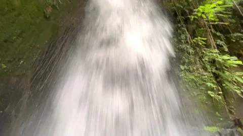 Close-up of powerful raging Sumampan waterfall with turbulent water. Crystal 스톡 동영상 220855177
