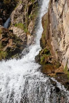 Close-up of a powerful waterfall in the wild in high quality. Stock Photos