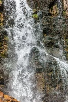 Close-up of a powerful waterfall in the wild in high quality. Stock Photos