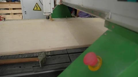 Close-up of a powerful wood cutter working with plywood in a carpentry workshop. Stock Footage 291515683