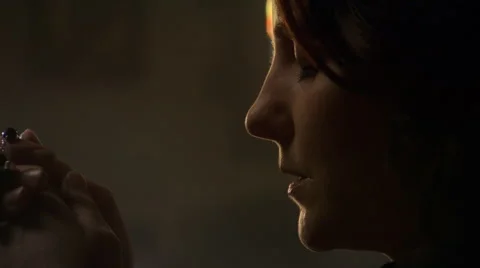 Close-up of praying woman's face, left pan to rosary in hands Stock Footage 59250441