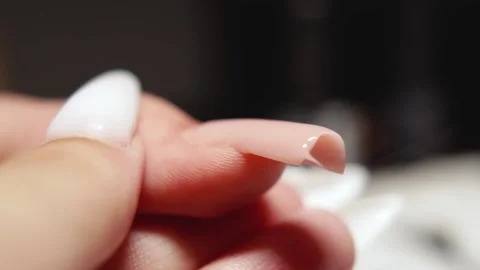 Close-Up of Precise Gel Polish Application with Fine Brush Stock Footage 316305943