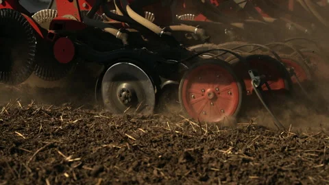 Close-Up Of Precision Air Seeder Disc Openers Cutting Soil And Planting Crops Stock Footage 305262047
