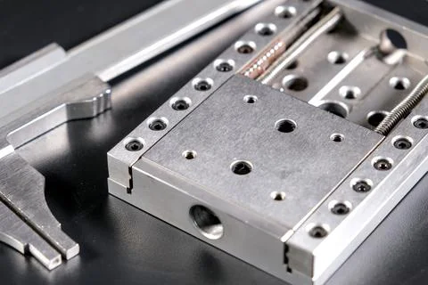 Close up of a precision linear motion guide rail and a caliper Stock Photos
