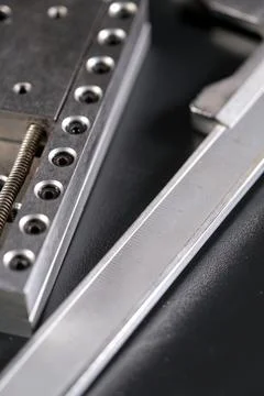 Close up of a precision linear motion guide rail and a caliper Stock Photos