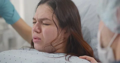 Close up of pregnant woman giving birth | Stock Video | Pond5