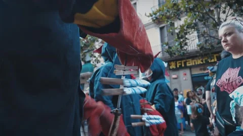 Close-Up Prep: Diables Trident and Safety Gear Before Correfoc, Gràcia Barcelona Stock Footage 319515403