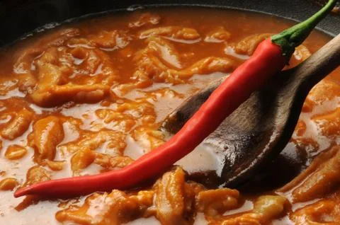 Close up of the preparation of parmesan tripe with chilli pepper Stock Photos