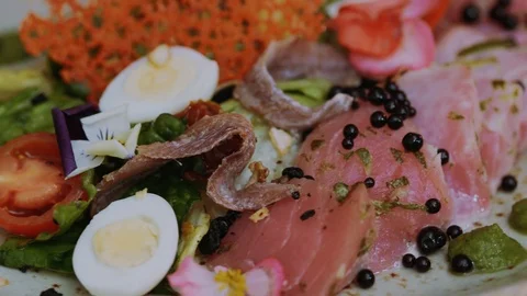 Close up prepared dish with leaves of lettuce with vegetables and meat delicious Stock Footage 100303652