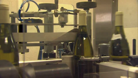 Close up of preparing of bottles of Chablis wine Stock Footage 130350894