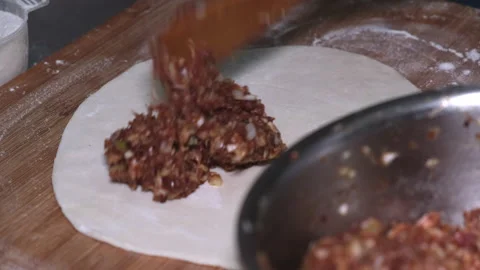 Close up of preparing Chinese meat pie in kitchen Stock Footage 130858950