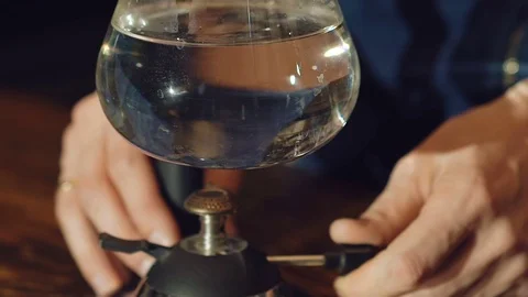 Close up of preparing coffee in alternative vacuum coffee maker Stock-Footage 70266989