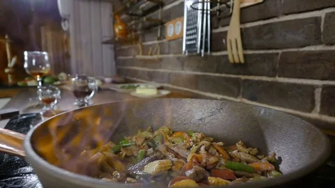 Close-up of a Preparing Flambe Style Dish on a Pan at home. Vegetables, meat Video stock 81788114