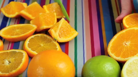 Close up preparing oranges in colorful kitchen Stock Footage 42181305