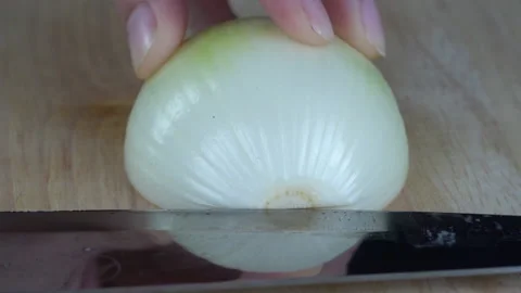 Close up preparing to slice the onion to be like dices Stock Footage