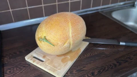 Close Up Presentation of Fresh Ripe Melon at Home Stock Footage 315991719