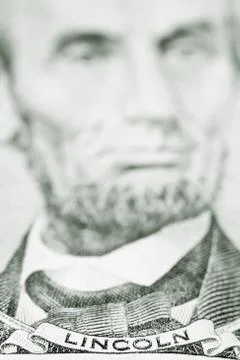 Close up of president lincoln on five dollar bill Stock Photos