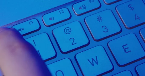 Close-up. Pressing the ESC button on the computer keyboard. Prores HQ. Stock Footage 168747438