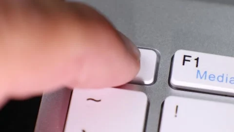 Close-up of pressing escape key on keyboard Stock Footage 344814018