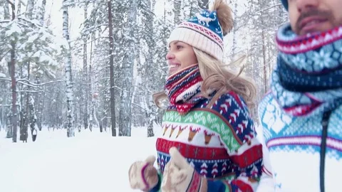 Close-up of a pretty couple doing some sport in the forest Видео 71251500