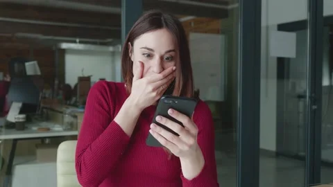 Close Up of Pretty Girl Chatting in Using her Smartphone, Looking at the Screen, Stock Footage 150778354
