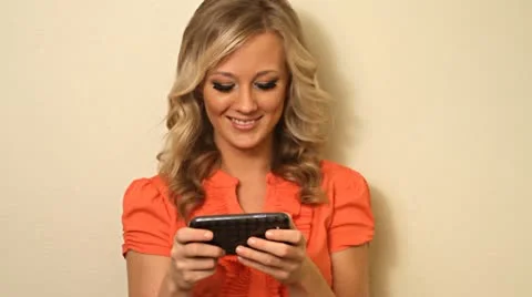 Close up of pretty happy blond business woman reading text message Stock Footage