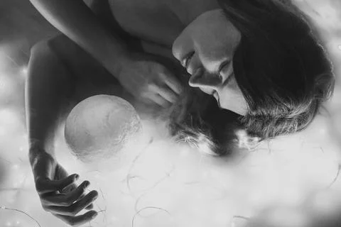 Close up pretty lady with magic sphere monochrome portrait picture Stock Photos