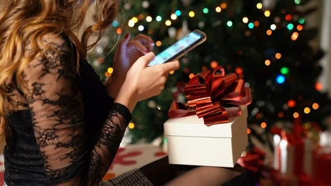 Close-up of pretty trendy dressed brown hair girl using mobile phone and sending Stock-Footage 118225228