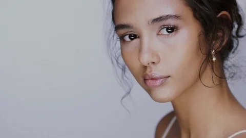 Close-up of pretty young female smiling to the camera with no make up and Stock Footage 123729498