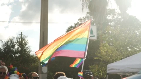 Close Up of Pride Flags Waving in the Air at River City Pride Parade in Stock-Footage 117583801