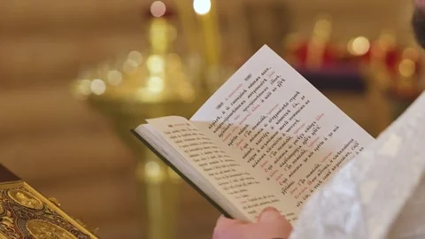 Close-up of the priest's hands with the prayer book. The Holy Father. Stock Footage 169165637