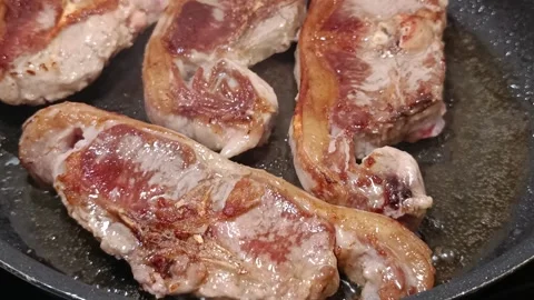Close-up of prime lamb loin chops cooking. Stock Footage 342224341