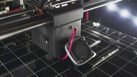 Close-up of the print head of the 3D printer Stock Footage 130777645