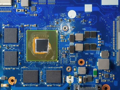 Close up of a printed blue computer circuit board. Stock Photos