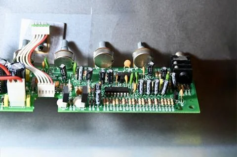 Close-Up of Printed Circuit Board with Capacitors, Resistors, and Potentiom.. Stock Photos