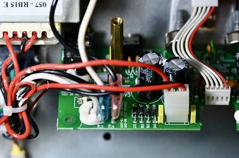 Close-Up of Printed Circuit Board with Capacitors, Resistors, and Potentiom.. Stock Photos