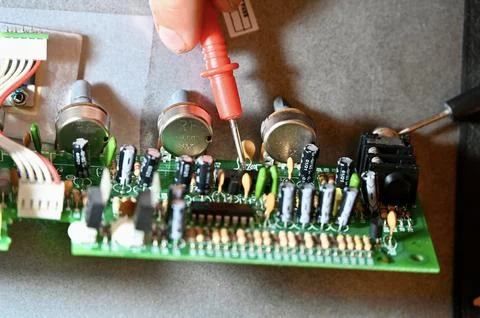 Close-Up of Printed Circuit Board with Capacitors, Resistors, and Potentiometers Stock Photos