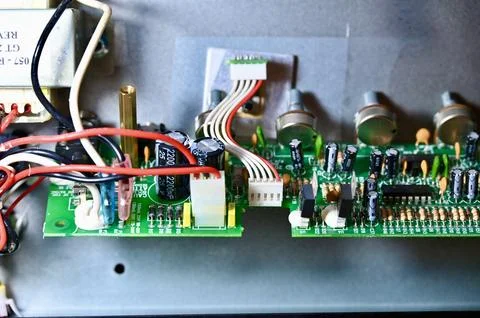 Close-Up of Printed Circuit Board with Capacitors, Resistors, and Potentiom.. Stock Photos