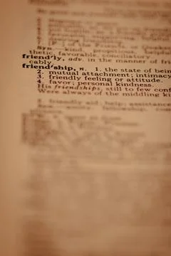 Close up of printed dictionary definition of the word friendship Stock Photos